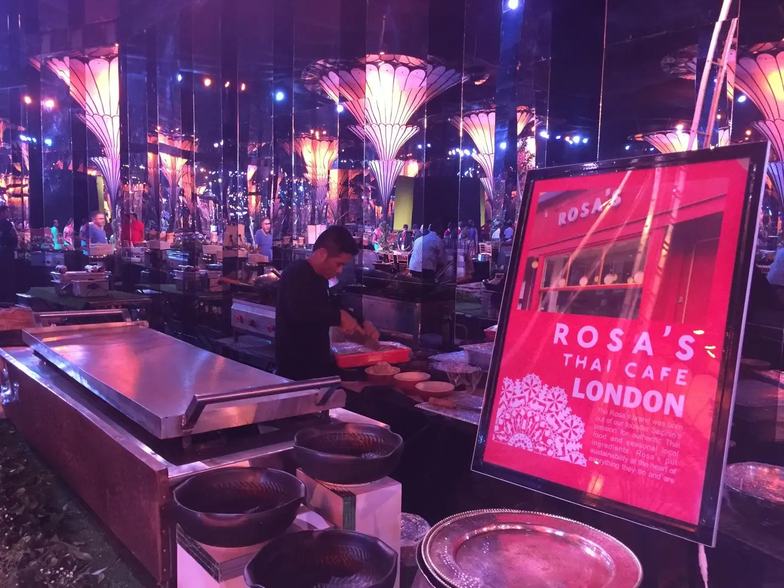 Rosa's Thai Cafe live cooking station at a night event